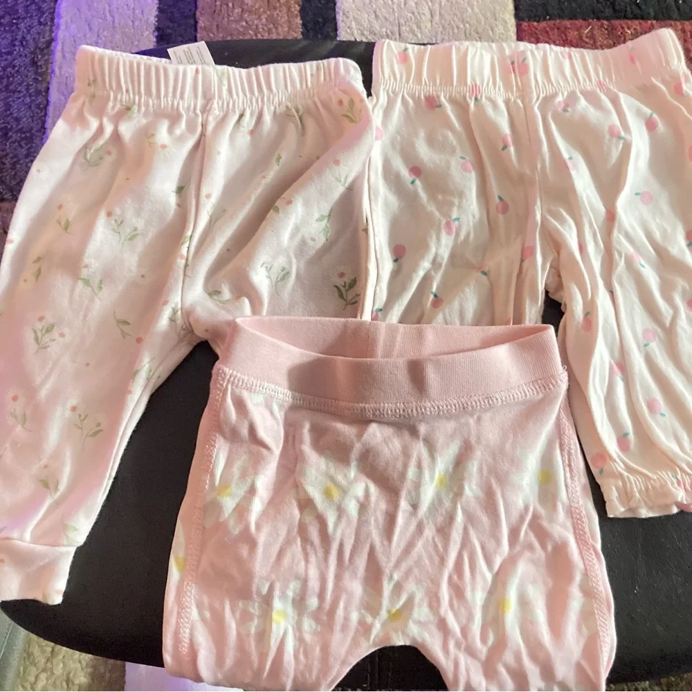 Three pairs of baby pants 0-3 months